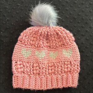 Pink and Gray Knit Hat with Textured Pattern and Pom Pom